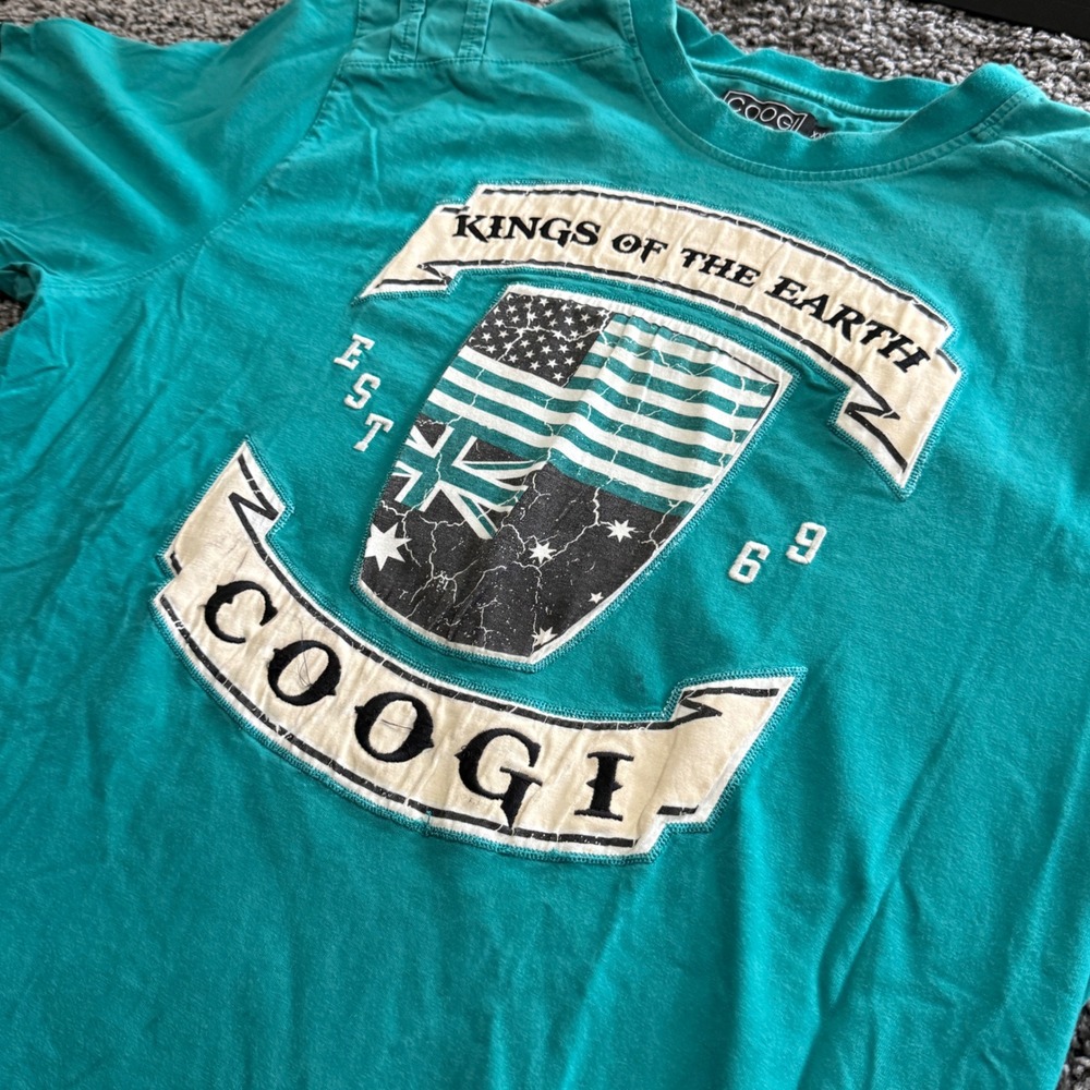 Vintage Coogi T Shirt Mens XXL Teal Kings of the Earth Graphic Crest Tee 0000221